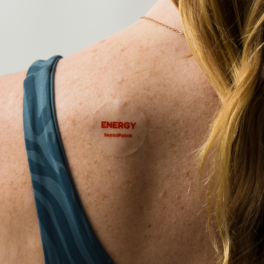 Person wearing the Energy SensaPatch, part of the wellness patch bundle for improved focus and vitality.